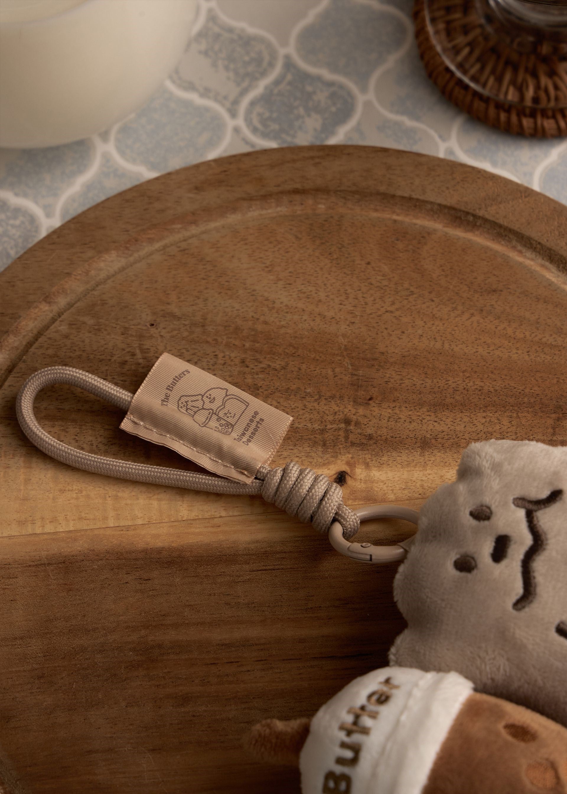 The Butters Canelé Bubble Milk Tea Plush Charm