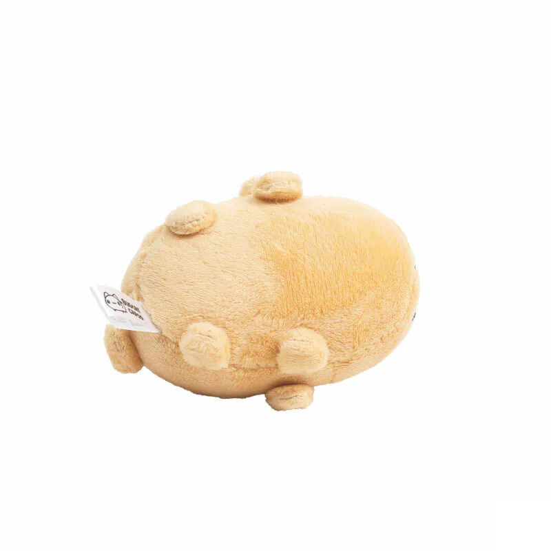 Bottom view of Dogdog Lazy Plush Charm, featuring small round legs and the official Bugcat Capoo tag.