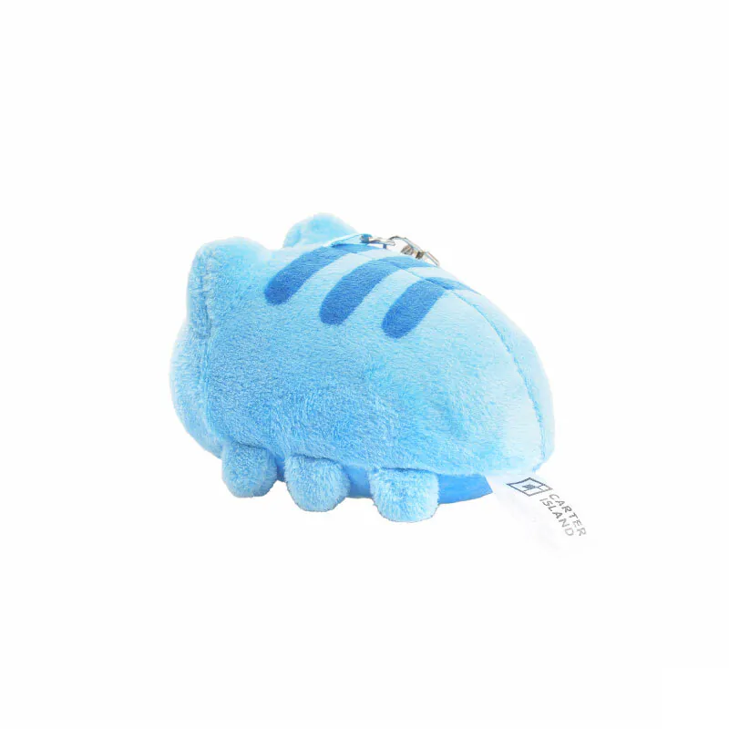 Right side view of the plush charm, showing tail tag and soft curved body design.