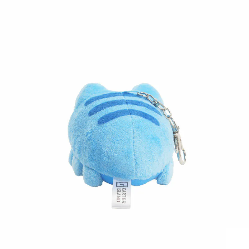 Back view of Lazy Capoo plush charm, featuring stripe pattern and metal keychain with visible Carter Island logo tag.
