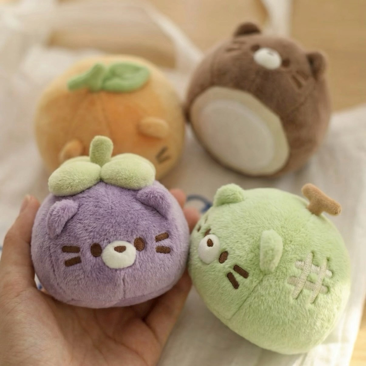 Mangosteen Cat Plush Charm