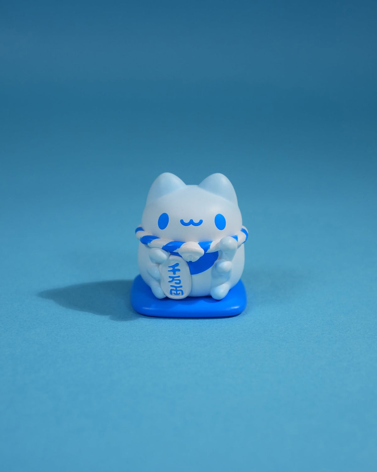 Mini Lucky Capoo Figure – Mount Fuji Blue collectible figure product photo on blue background