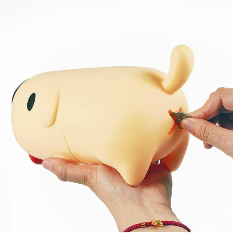 A person putting a coin into Dogdog Coin Bank