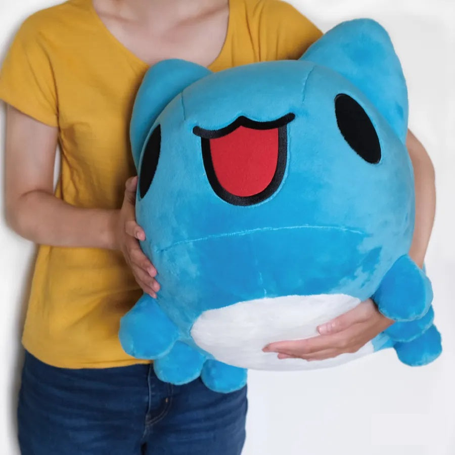 A person standing and grabbing the Gigantic Capoo Plush