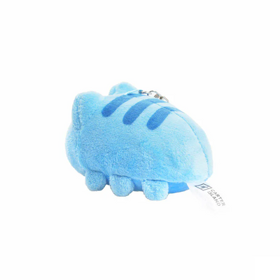 Right side view of the plush charm, showing tail tag and soft curved body design.