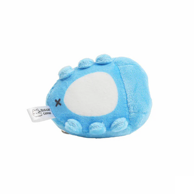Bottom view of the plush charm, with white belly patch and tiny stubby feet.