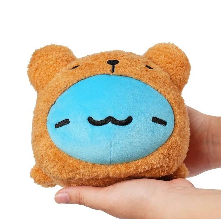 Hand holding the Brown Bear Costume Mini Lazy Capoo Plush: Person holding plush to show its size.